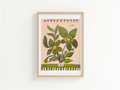 Framed artwork of a floral design on a white wall